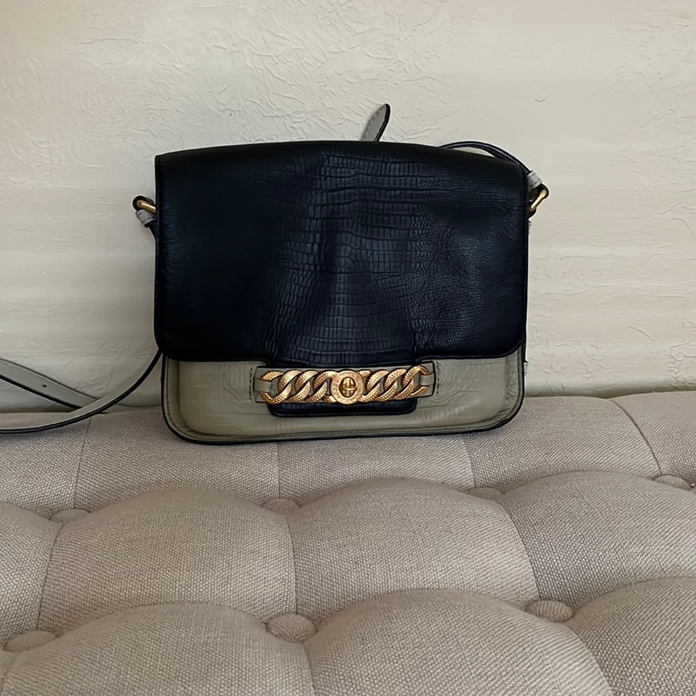 Green and black Marc by Marc Jacobs crossbody purse.